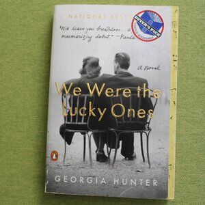 National Best Seller, Paperback book: We Were The Lucky Ones by Georgia Hunter